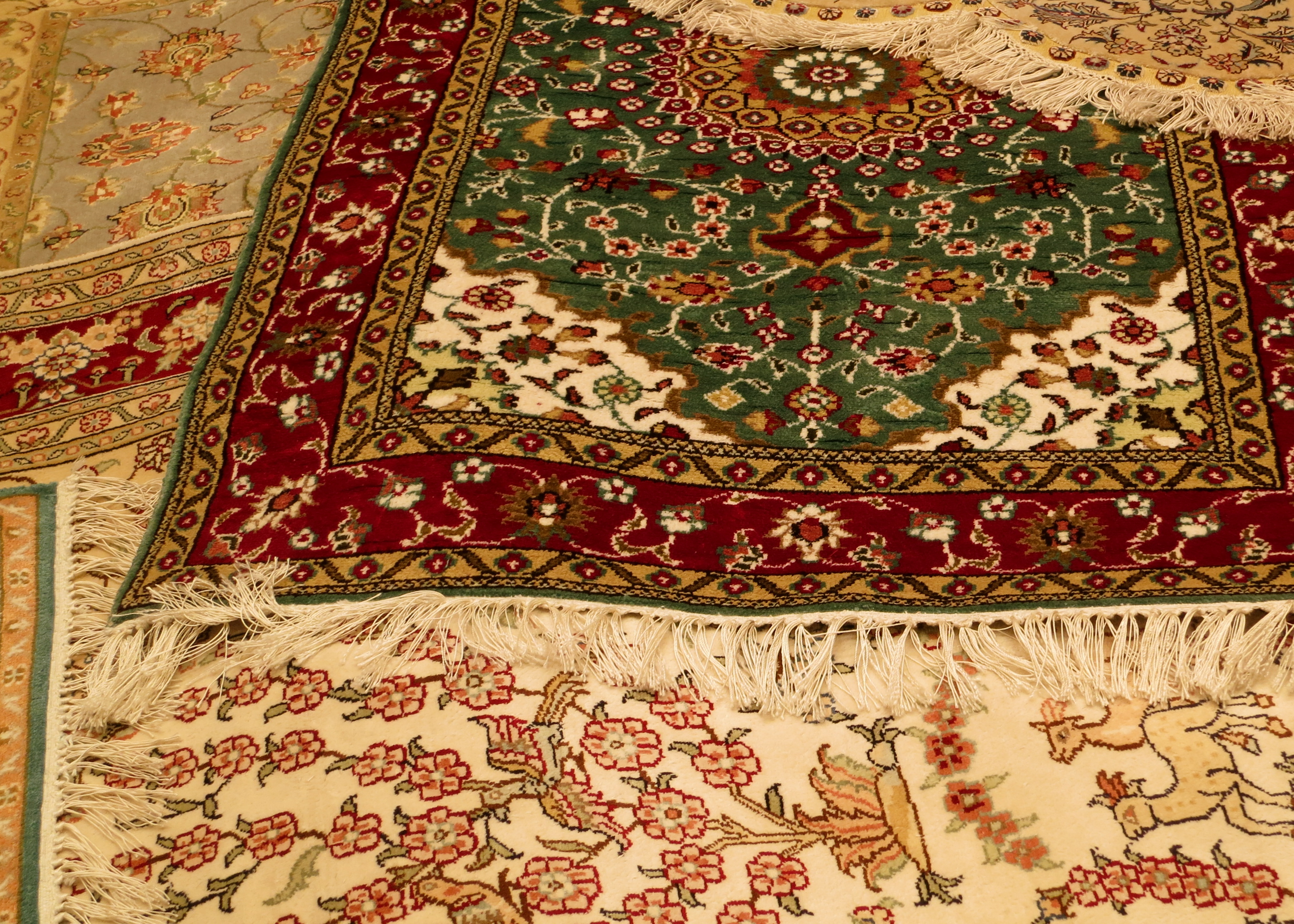 Dozens of Turkish rugs were scattered on the floor in Kusadasi, Turkey, thrown out in a frenzy of encouraging us to buy.