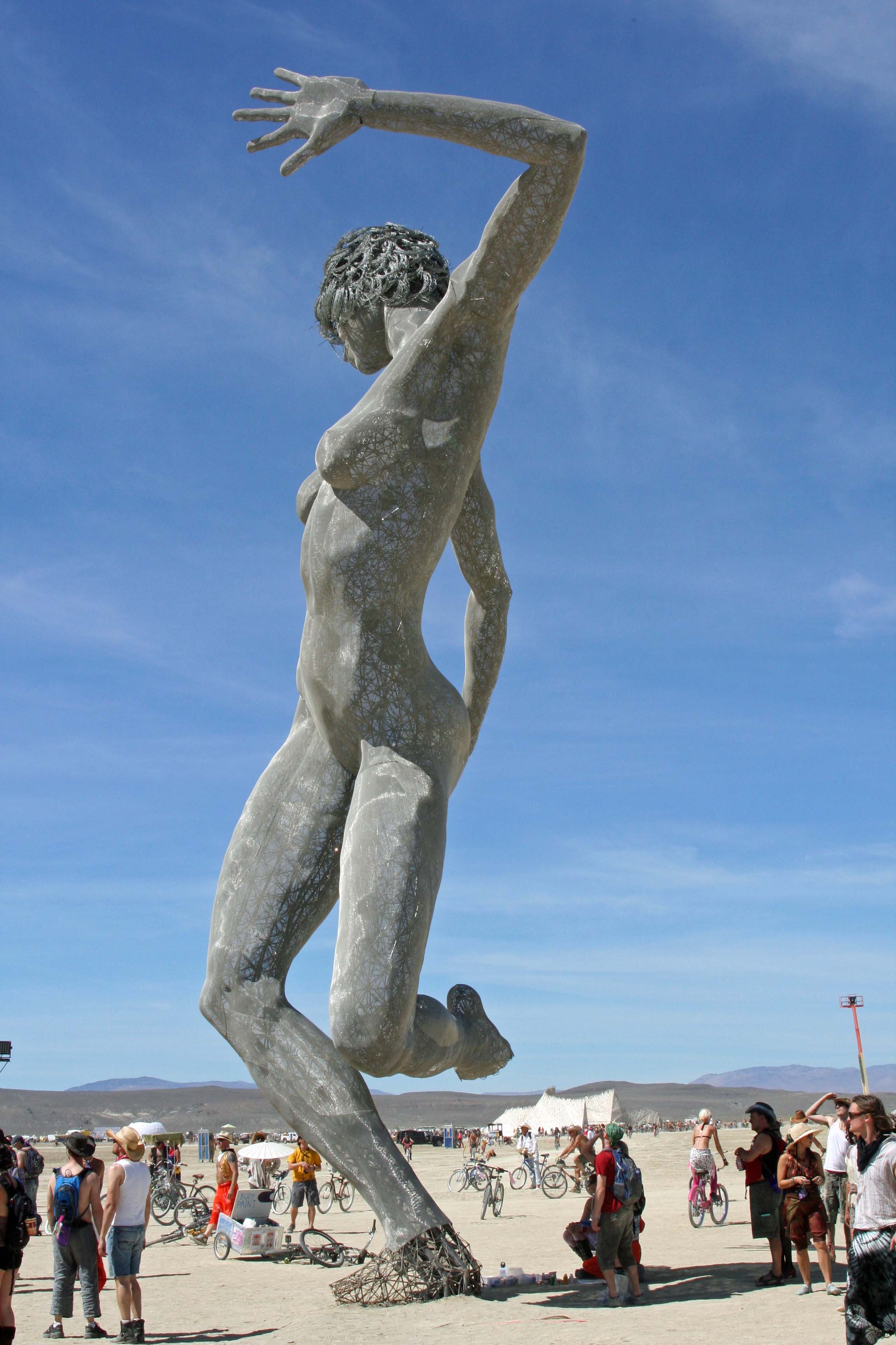 The art at Burning Man can be spectacular, such as this tall, nude woman.
