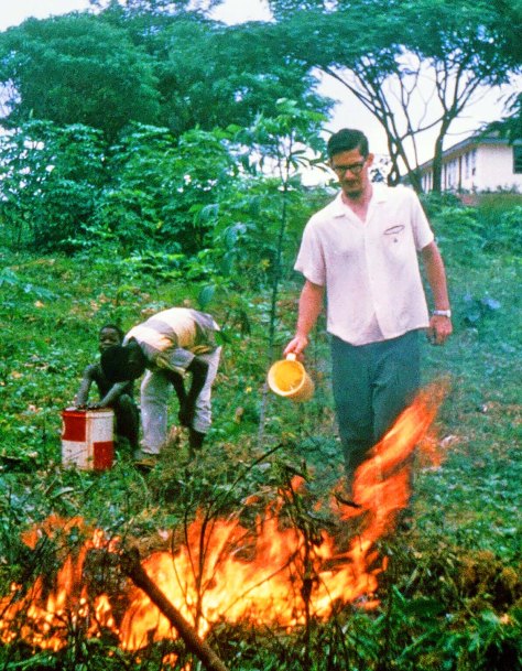 Burning out a nest of army ants in Gbarnga, Liberia circa 1966.