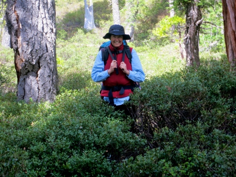 Peggy Mekemson stands on trail in Red Buttes Wilderness.