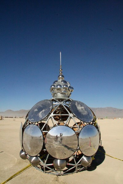 In fact I am always photographing myself in mirrors at Burning Man. (I'm the tiny image.) Is it ego? Or is it simply the fact that it is damned hard to photograph a mirror without putting yourself in it?