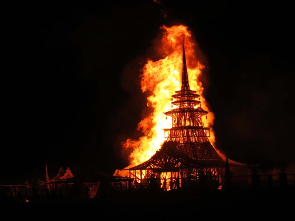 The temple of Juno from 2012 burns, shooting flames high into the sky.