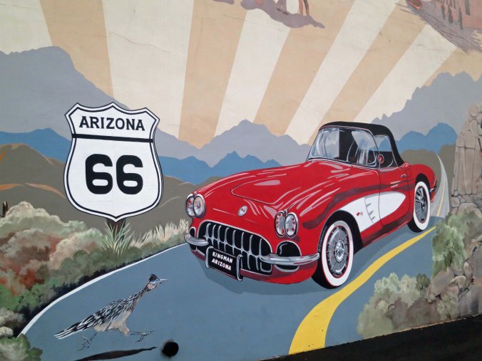 A number of murals depict a romanticized view of travel on the highway.