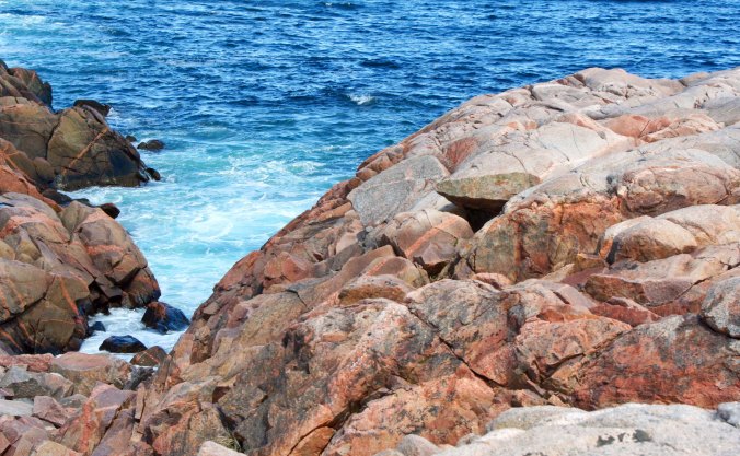 Rocky shores touched by the Atlantic Ocean are a key element in the scenic beauty of the Cape Breton Highlands along the Cabot Trail.
